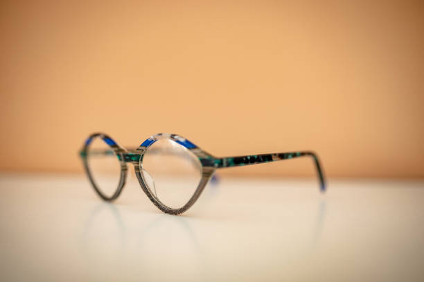 istock Stylish modern eyewear resting on a surface with a warm background 2206123337