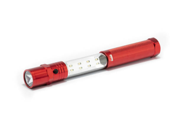 A portable LED lamp with a transparent cover and a black handle. The lamp is positioned on a white background, showcasing its design and functionality.