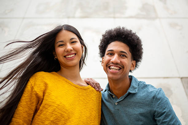 istock smiling young hispanic couple 2206127466