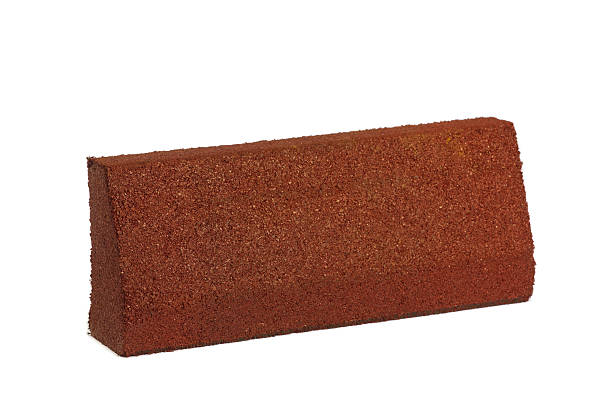 istock A Close-up Image of a Red Brick, Featuring a Rough Texture and Angular Shape, Perfect for Construction Applications and Artistic Displays in Architecture and Design Projects 2206128819