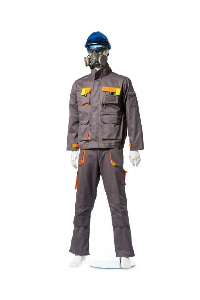 istock High-Visibility Protective Workwear with Gas Mask and Safety Helmet for Construction and Hazardous Environments, Ensuring Safety and Compliance on Job Sites. 2206129356