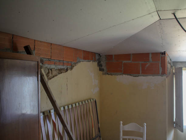 istock arranging a room to be painted 2206129551