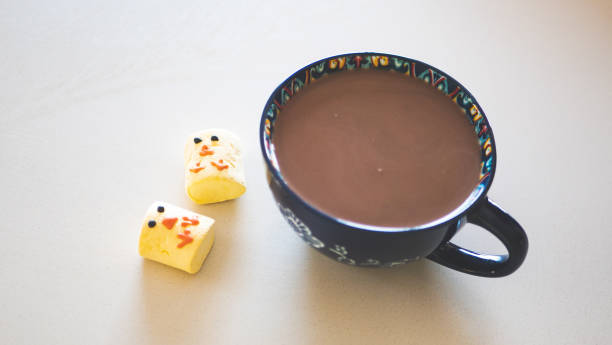 Hot chocolate with easter themed chick yellow marshmallows holiday happy