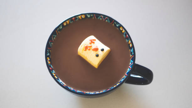 Hot chocolate with easter themed chick yellow marshmallows holiday happy