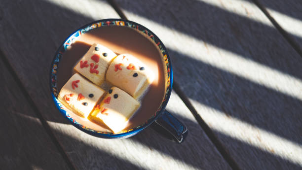 Hot chocolate with easter themed chick yellow marshmallows holiday happy