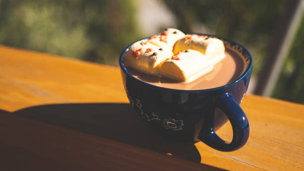 Hot chocolate with easter themed chick yellow marshmallows holiday happy