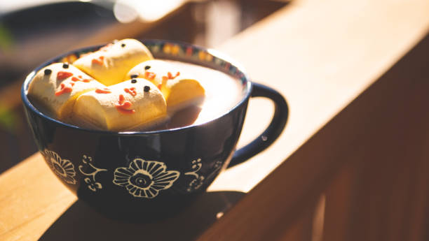 Hot chocolate with easter themed chick yellow marshmallows holiday happy