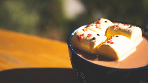 Hot chocolate with easter themed chick yellow marshmallows holiday happy