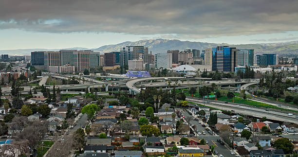 Aerial shot of Junipero Serra and Guadalupe freeway interchange overlooking Market - Almaden, a neighborhood in San Jose, Santa Clara County, California \n\nAuthorization was obtained from the FAA for this operation in restricted airspace.