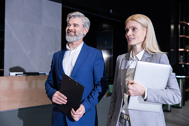 istock Business colleagues standing together talking about professional growth 2206139830