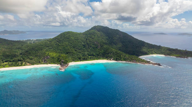 istock Expansive ocean view with multiple islands and green landscape. Seychelles, La Digue. 2206143133