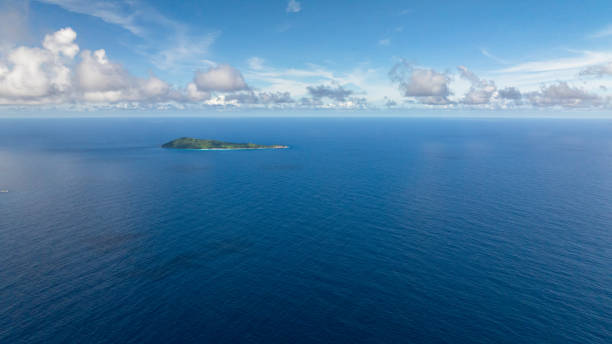 istock Small tropical island surrounded by vast blue ocean. Seychelles, La Digue. 2206143316