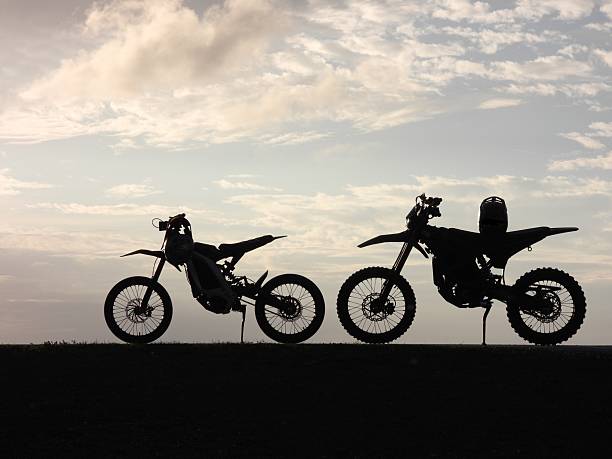 istock Electric bicycles in silhouette 2206147237