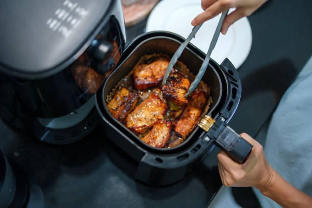 Air-Fried Grilled Pork Belly in a Home Kitchen stock photo