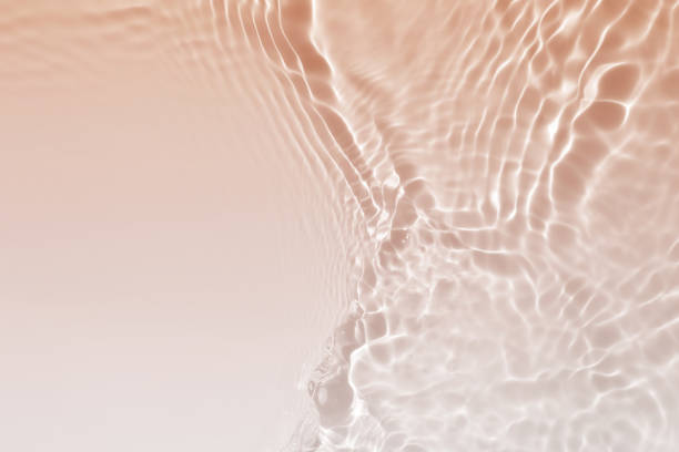 istock abstract orange white water wave. natural swirl pattern texture. background photography. 2206156620