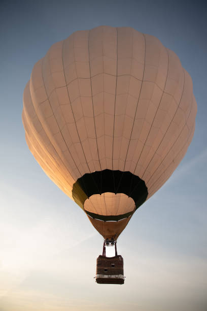 istock Hot air balloon in clear sky at dawn 2206162963