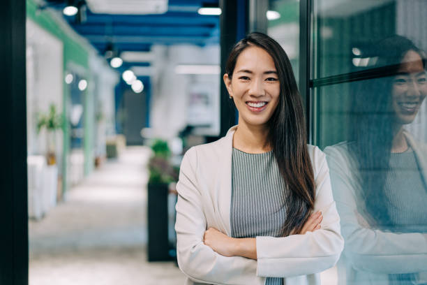 istock Confident businesswoman in modern office. 2206170343