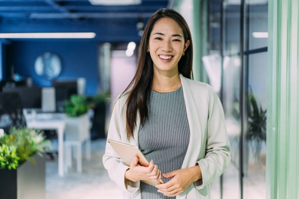 istock Confident businesswoman in modern office. 2206170345