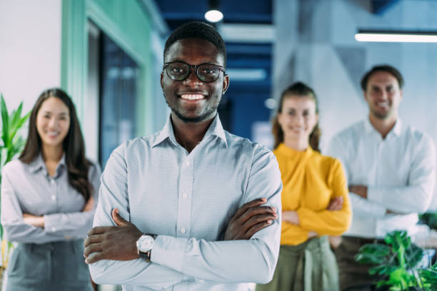 istock Confident businessman and his team. 2206170906