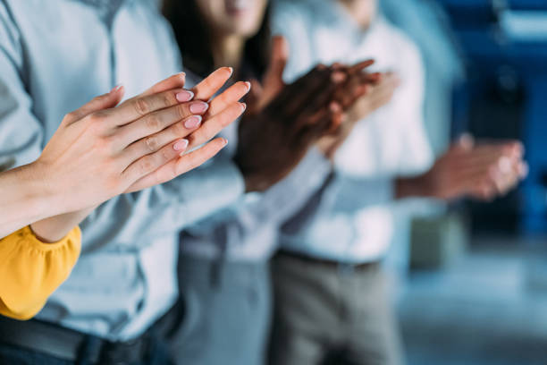 istock Businesspeople applauding during a seminar in conference hall. 2206170967