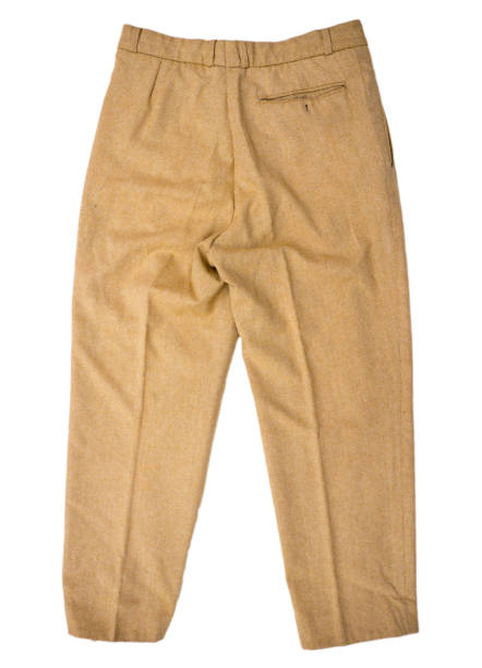 istock Yellow men's trousers on a white background. Back side. 2206173430