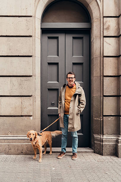 istock Man walking the dog 2206179296