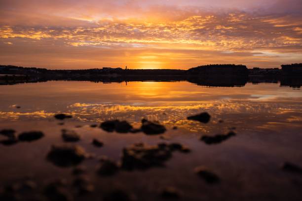 istock Stunning sunset over calm lake 2206183703