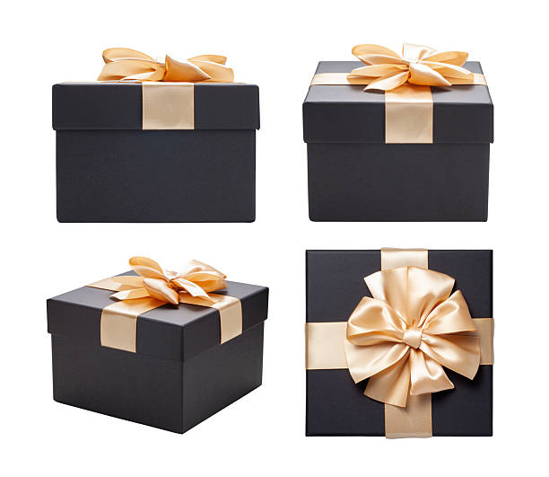 istock black gift box with champagne gold ribbon bow 2206183728