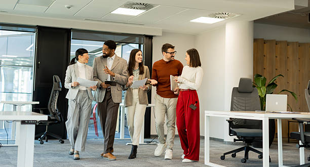 istock Team collaboration in a modern office environment on a sunny afternoon 2206186025
