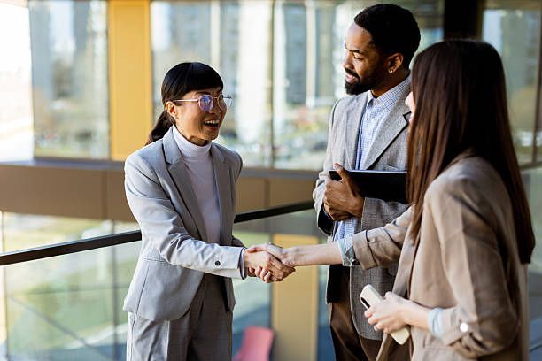 istock Business professionals engage in a productive discussion at a modern office 2206186039