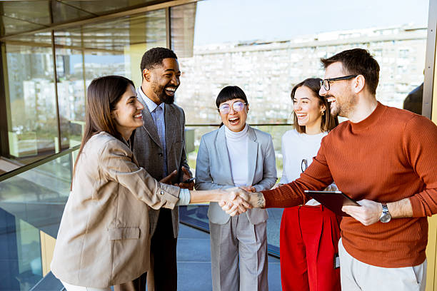 istock Networking and collaboration flourishes during a business meeting in a modern office setting 2206186052