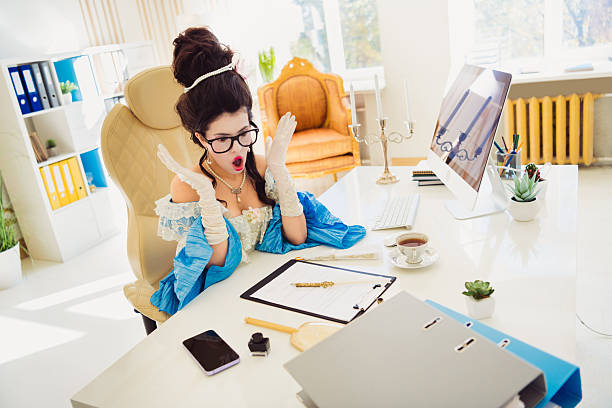 Elegant Woman in Historical Costume Working in Modern Office Setting, Highlighting the Blend of Historical and Contemporary Themes