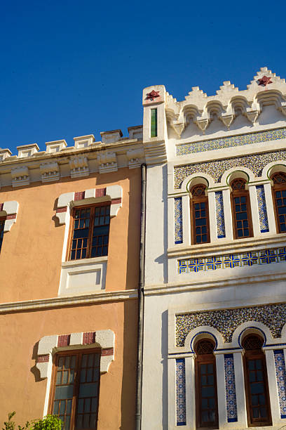 istock Ornamental windows in arab inspiration facade 2206188628