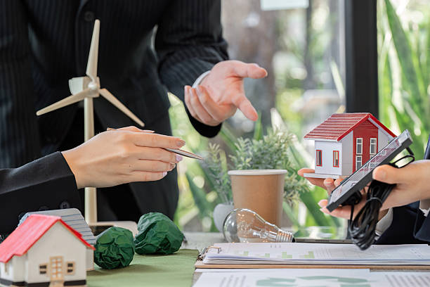istock Collaboration and Sustainable Energy. A professional team discusses model projects with a focus on solar energy. 2206190842