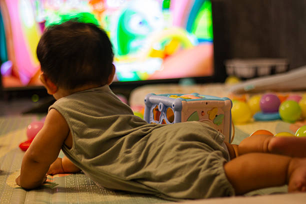 istock Baby In Bodysuit Is Crawling On A Soft Mat 2206195830