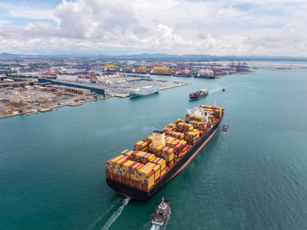 istock cargo container ship carrying sailing in sea import export goods and distributing products to dealer consumers across Asia pacific and worldwide global business transportation by container ship, 2206196736