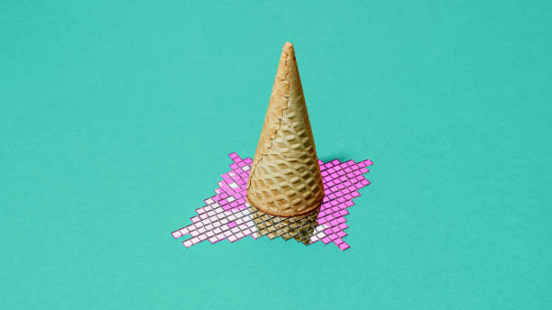 Waffle cone standing on a mirrored disco ball mosaic, reflecting light and creating the illusion of melting ice cream on a vibrant turquoise background.