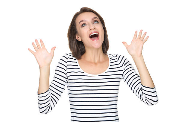 istock Beautiful excited woman isolated on white background 2206205560