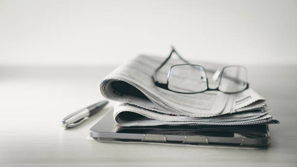 istock Newspaper concept on the desk 2206207282