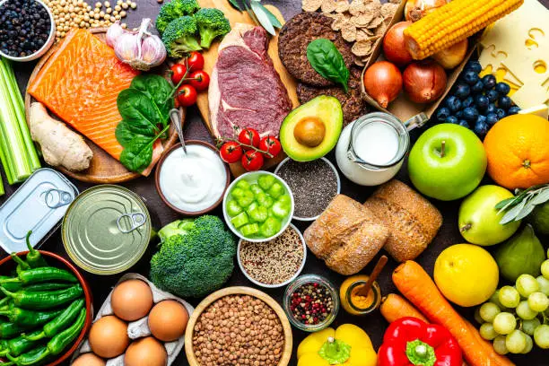 Large group of raw food for a well balanced diet. Includes carbohydrates, proteins and dietary fiber Large group of raw food for a well balanced diet. Includes carbohydrates, proteins and dietary fiber