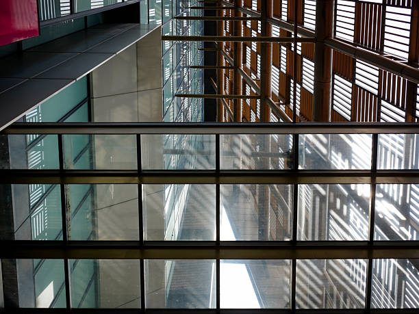 istock Looking up of modern office exterior 2206217919