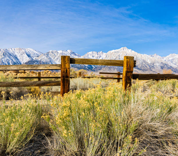 Old Horse Corral With The Snow Capped Sierra Nevada Mountain Range on Lubken Canyon Road, Lone Pine, California, USA
