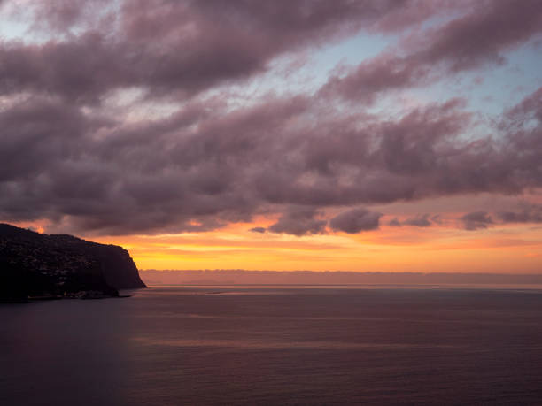 Morning mood over the sea with dramatic sky. Taken near the village of Punta do Sol on the island of Madeira.