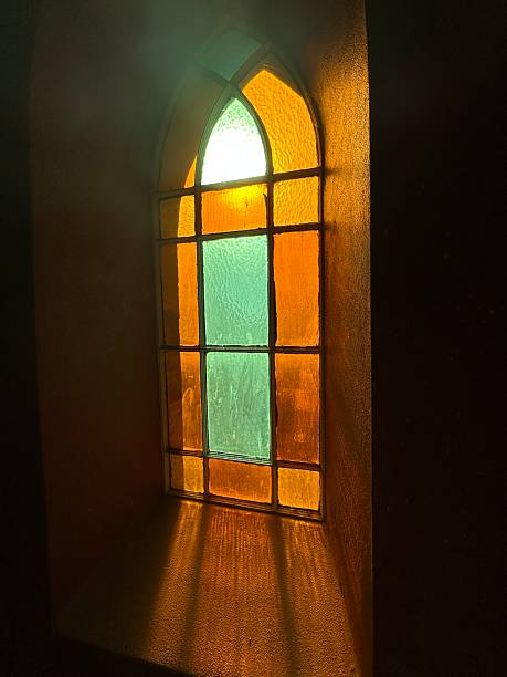 istock Sunrise through a lead glass window 2206222507