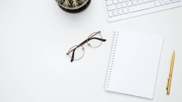 istock Flat lay composition with copy space. Mock up notebook. Office workspace and productivity concept 2206223617