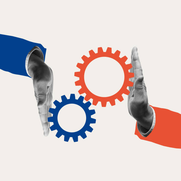 istock Two hands connecting gears, representing strategic alignment and integration, target companies, all set against a neutral backdrop. 2206224213