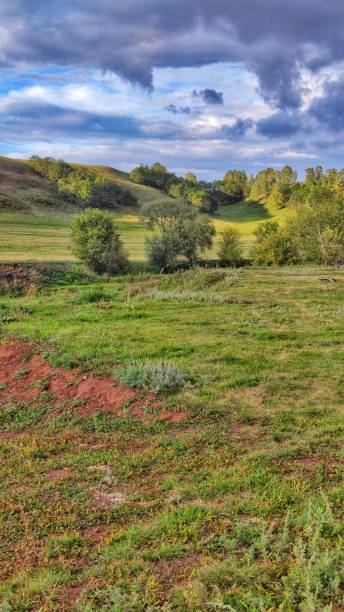 istock Valley with Rolling Hills of Serene Landscape 2206224423