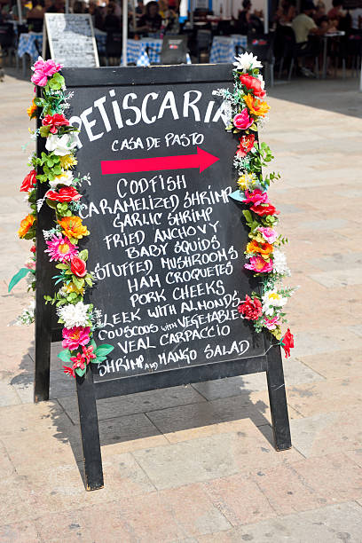 typical Portuguese menu in a restaurant in the pedestrianized historic center 18 September 2024 Olhao Portugal