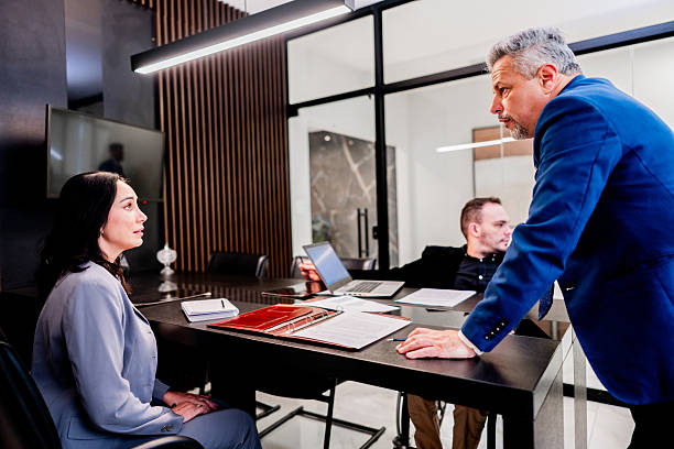 istock Mature leader man talking to employee at office 2206224553