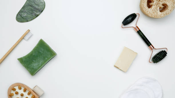 istock Embodying a sustainable self-care concept, eco-friendly beauty essentials, including soap, bamboo toothbrush, marble face roller 2206224576